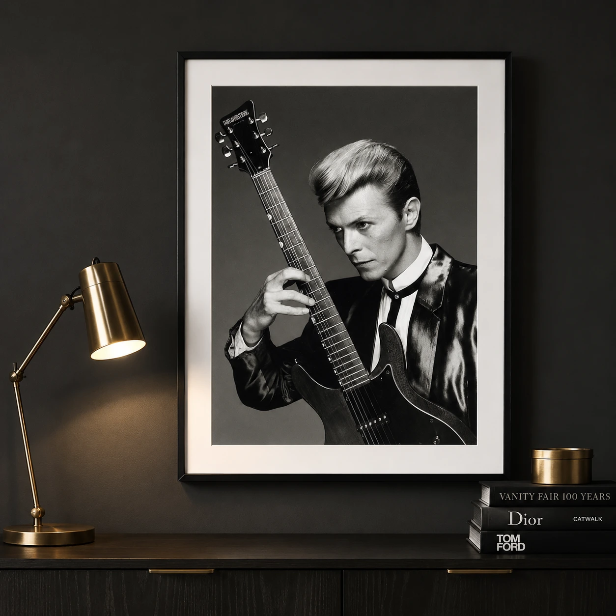 David Bowie 1988 Dan — sharp black and white portrait of David Bowie from 1988 holding a Dan