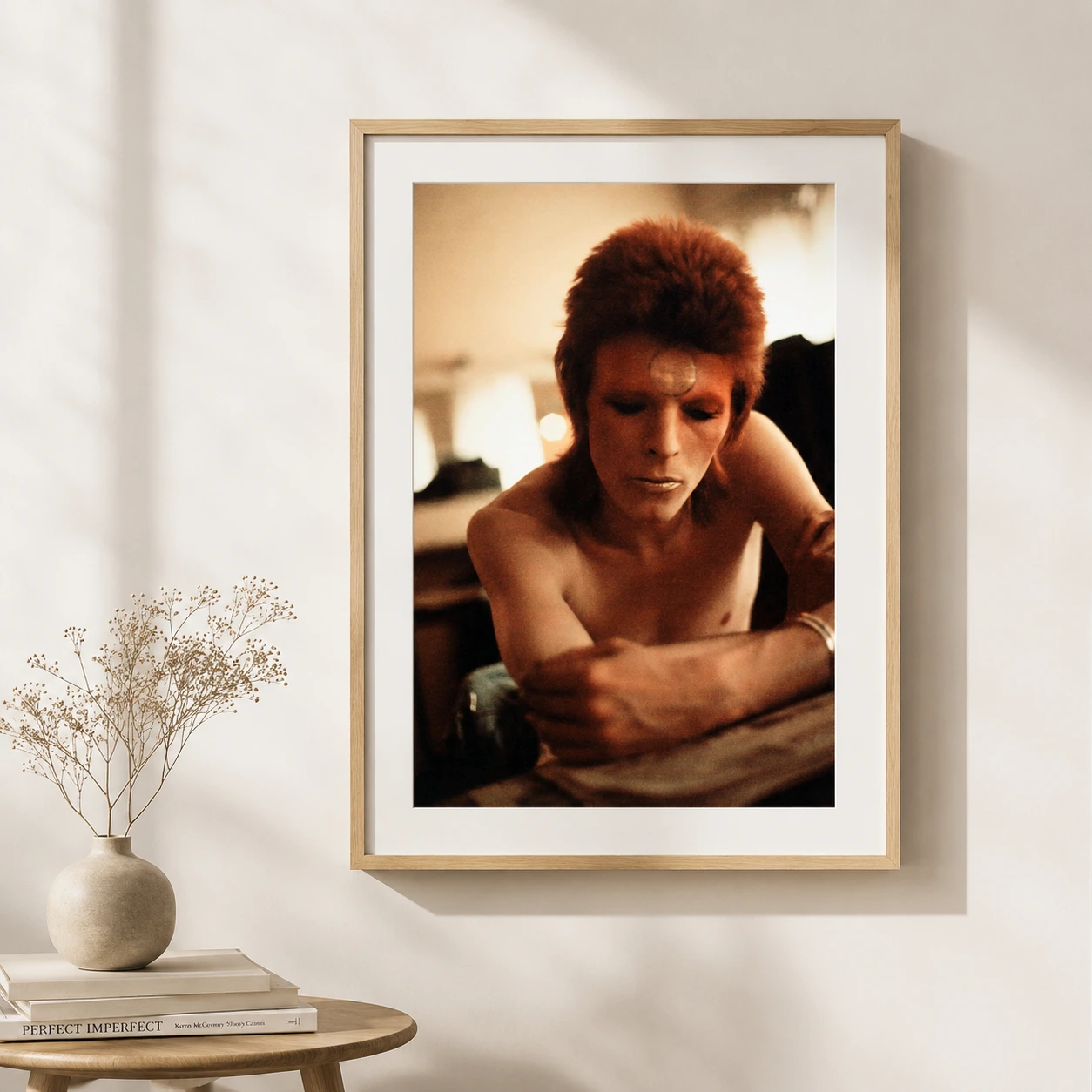 Ziggy Stardust — warm-toned photograph of David Bowie as Ziggy Stardust featuring the
