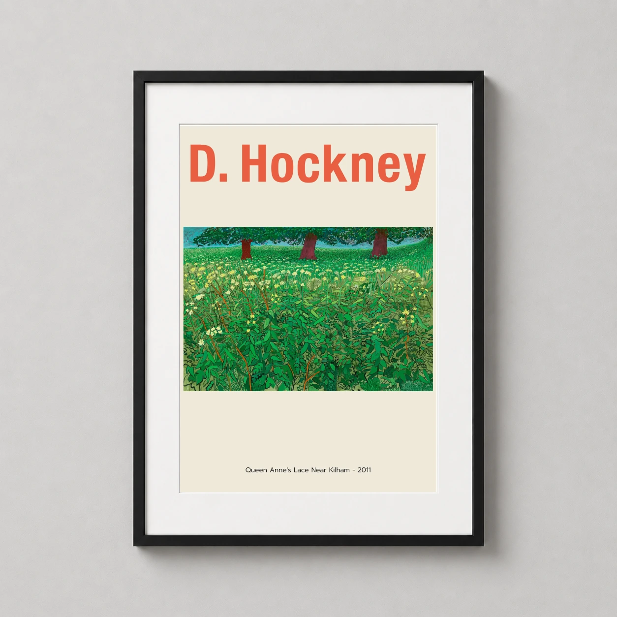 Room mockup of David Hockney Queen Anne's Lace Near Kilham 2011 Landscape Art Print, displayed as framed wall art in a dorm room setting as a portrait print with green and red tones.