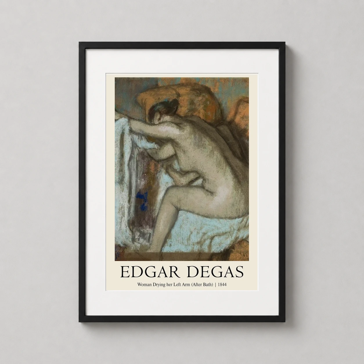 Room mockup of Edgar Degas Woman Drying Her Left Arm After Bath Art Print, displayed as framed wall art in a living room setting as a portrait print with blue, yellow, and brown tones.
