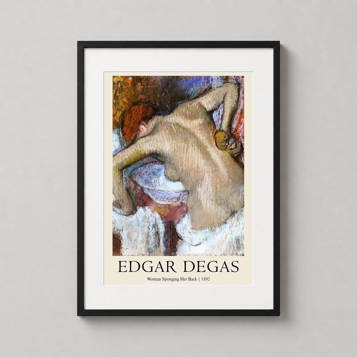Room mockup of Edgar Degas Woman Sponging Her Back 1892 Impressionist Art Print, displayed as framed wall art in a living room setting as a portrait print with blue, yellow, and white tones.