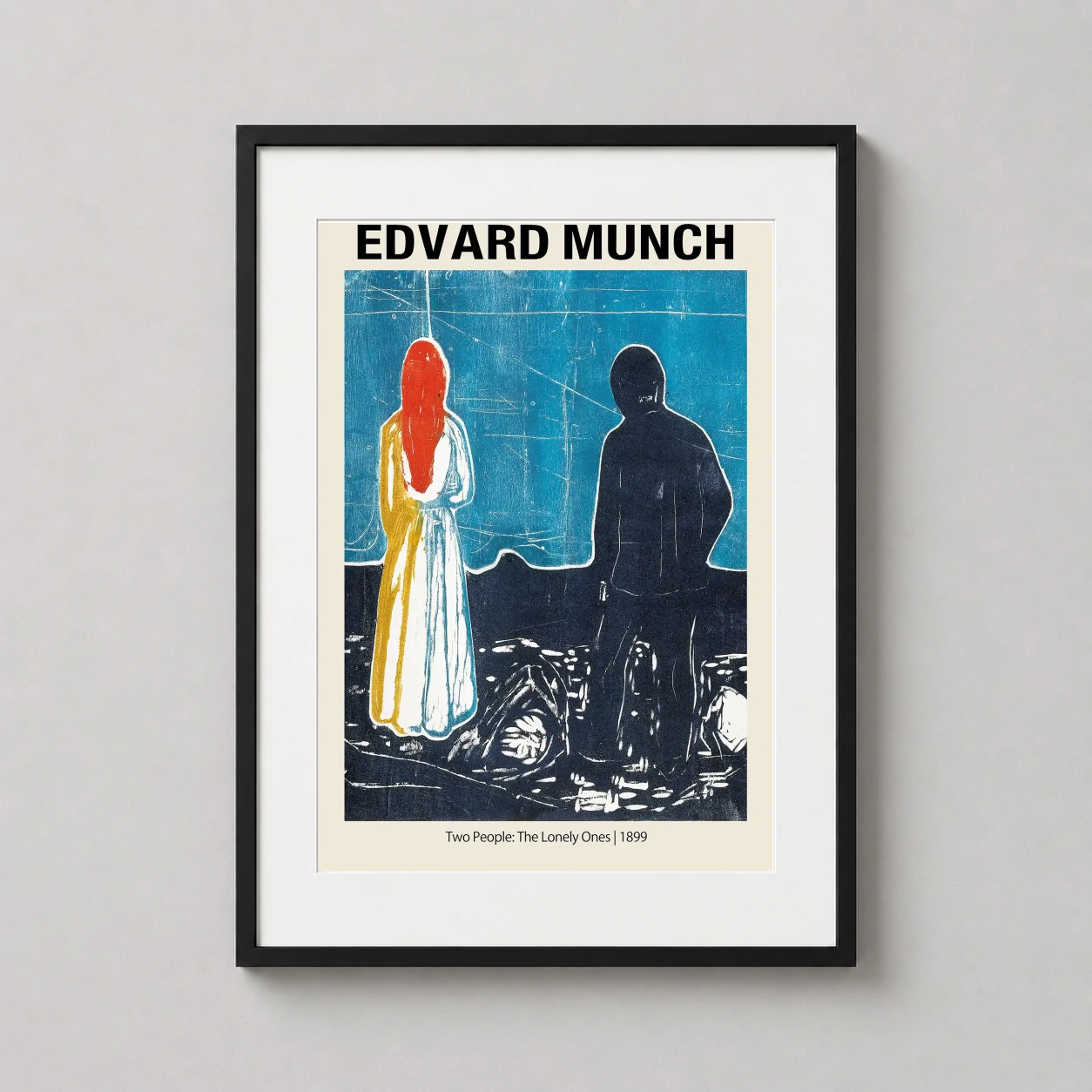 Room mockup of Edvard Munch, Two People The Lonely Ones 1899 Art Print, displayed as framed wall art in a living room setting as a portrait print with blue tones.