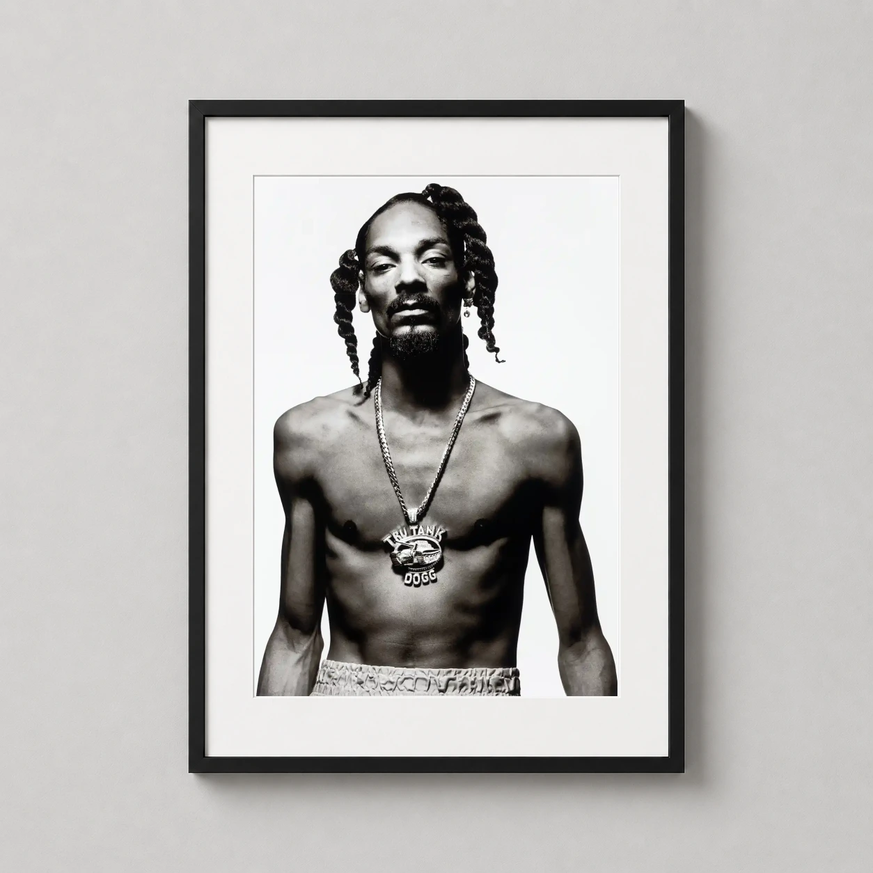 Snoop Dogg — raw 1992 black and white portrait of Snoop Dogg featuring his signature