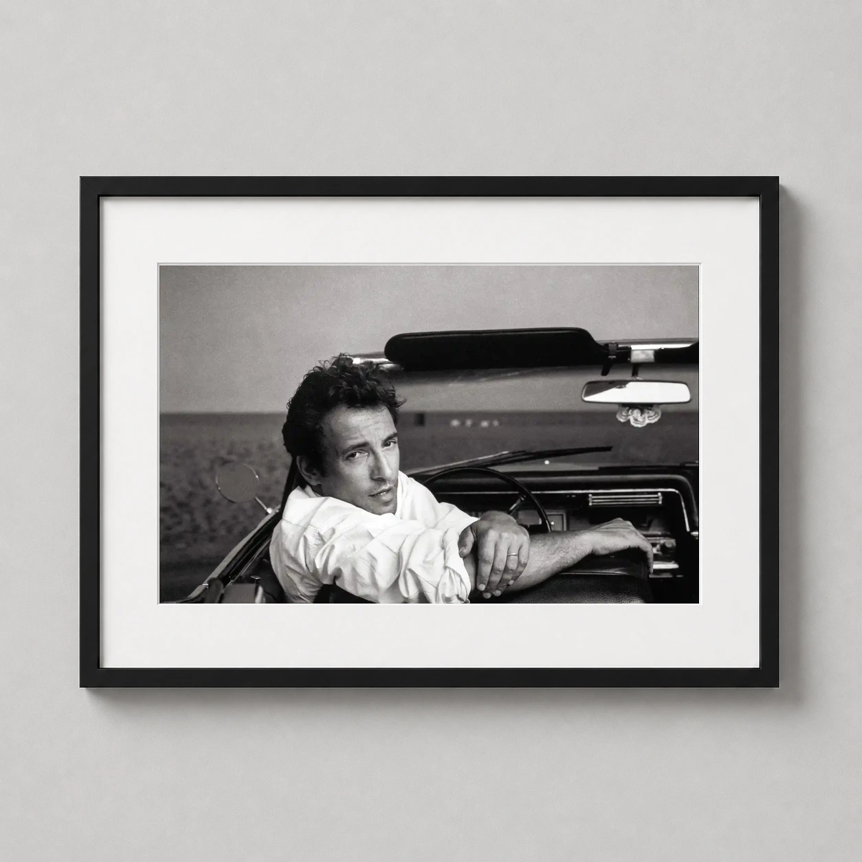 Bruce Springsteen Asbury Park — black and white Annie Leibovitz portrait of Bruce Springsteen leaning