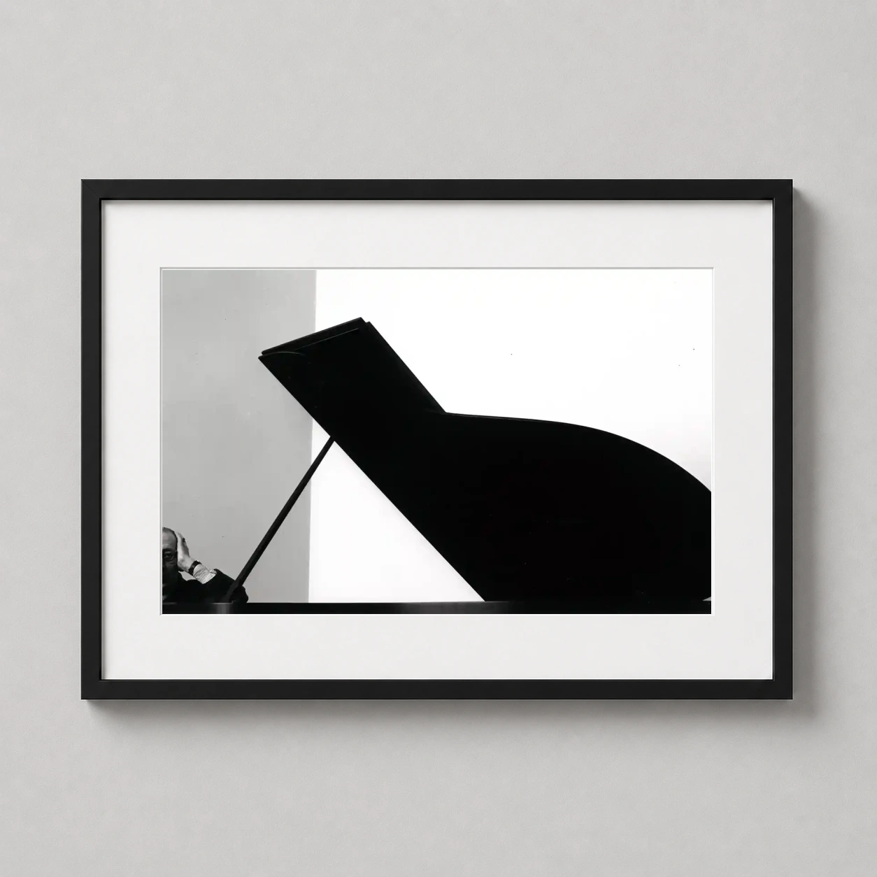 Igor Stravinsky Geometric Piano Photo — stark black and white portrait of composer Igor Stravinsky framed by