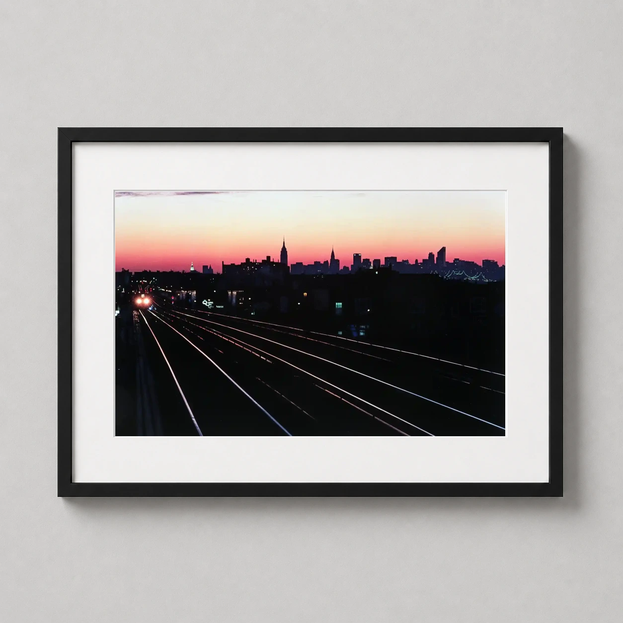 Bruce Davidson Nyc Queens — dramatic sunset silhouette of the Manhattan skyline viewed from the