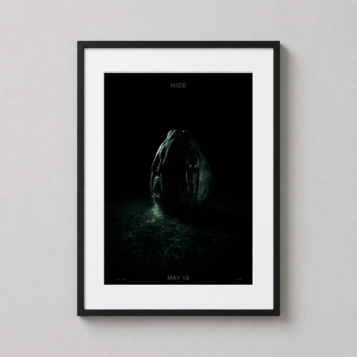 Room mockup of Alien Covenant Ovomorph Egg Dark Sci-Fi Horror Movie Poster, displayed as framed wall art in a home theater setting as a portrait print with green and black tones.