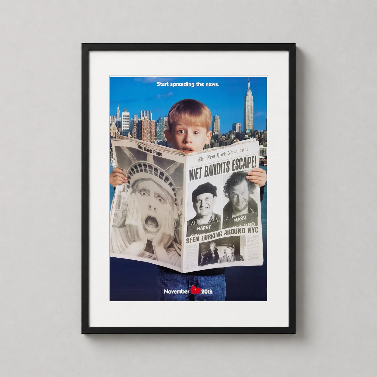 Home Alone 2 Lost in New York — kevin McCallister hides behind a New York newspaper announcing the Wet