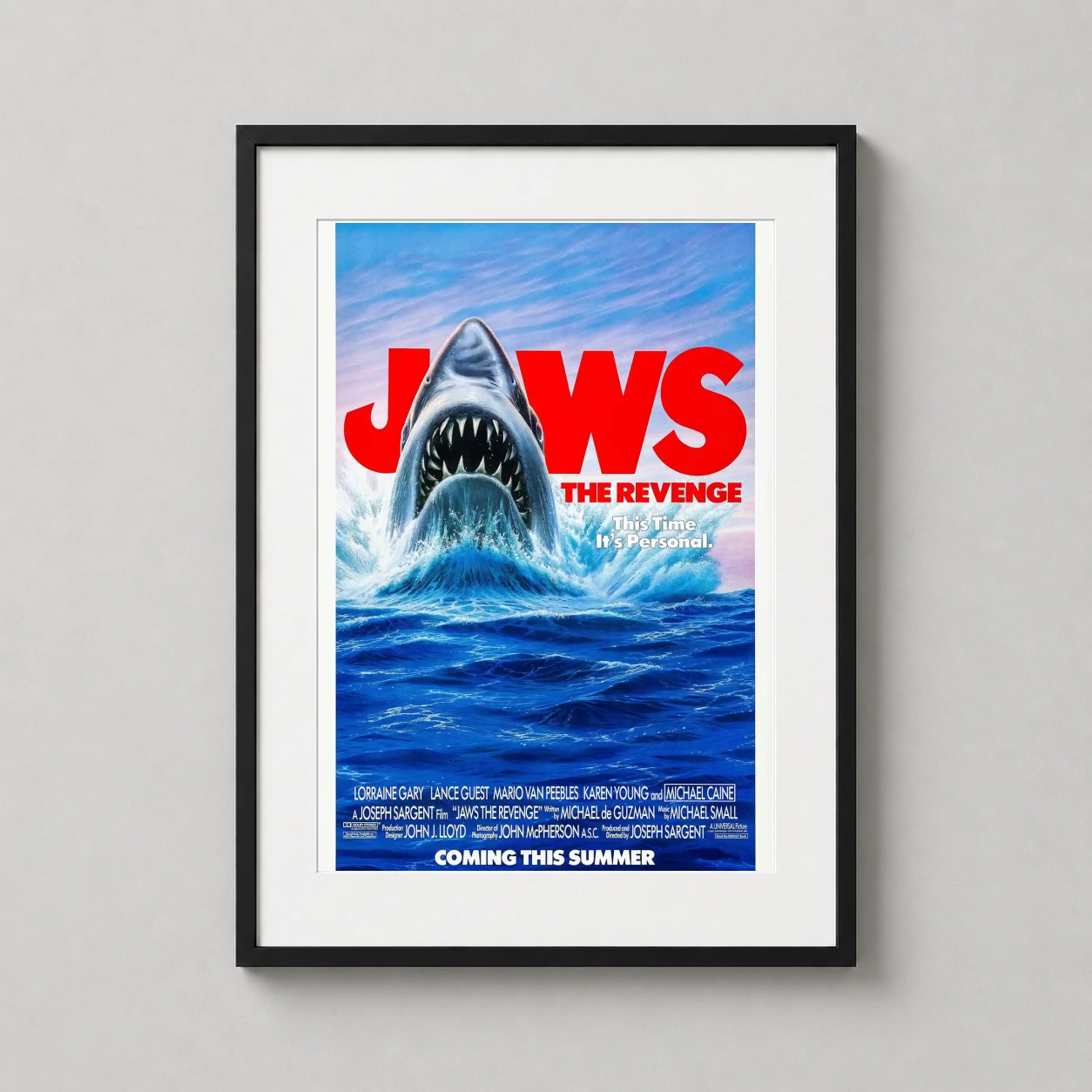 Jaws the Revenge — retro 1987 film poster for Jaws The Revenge featuring a massive great