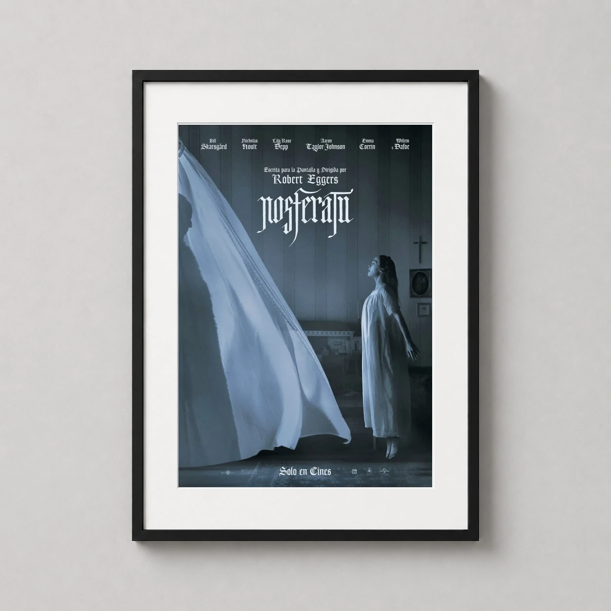 Room mockup of Nosferatu 2024 Gothic Shadow Art Movie Poster, displayed as framed wall art in a home theater setting as a portrait print.