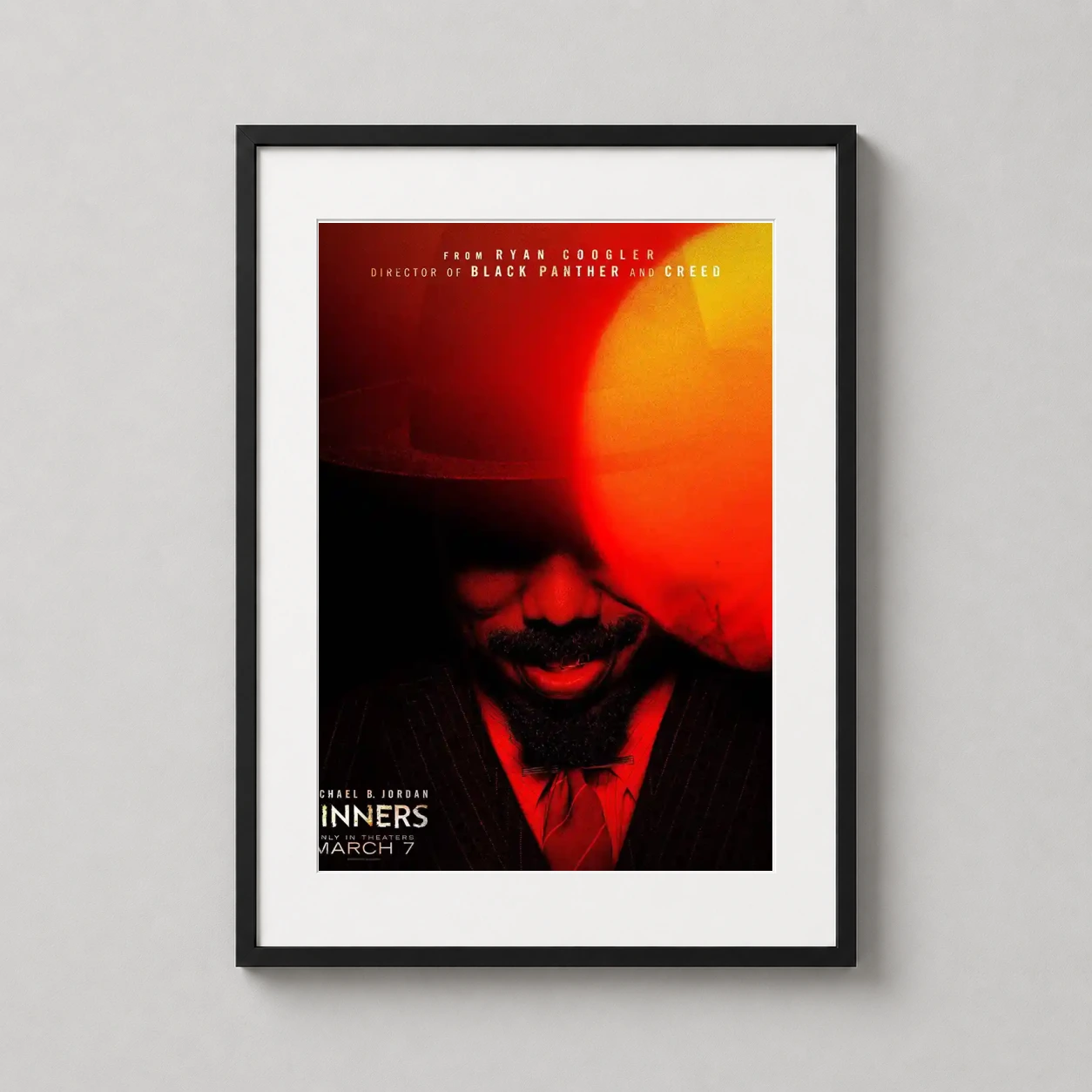 Michael B. Jordan Sinners — intense red-toned cinematic poster for the 2025 film Sinners featuring