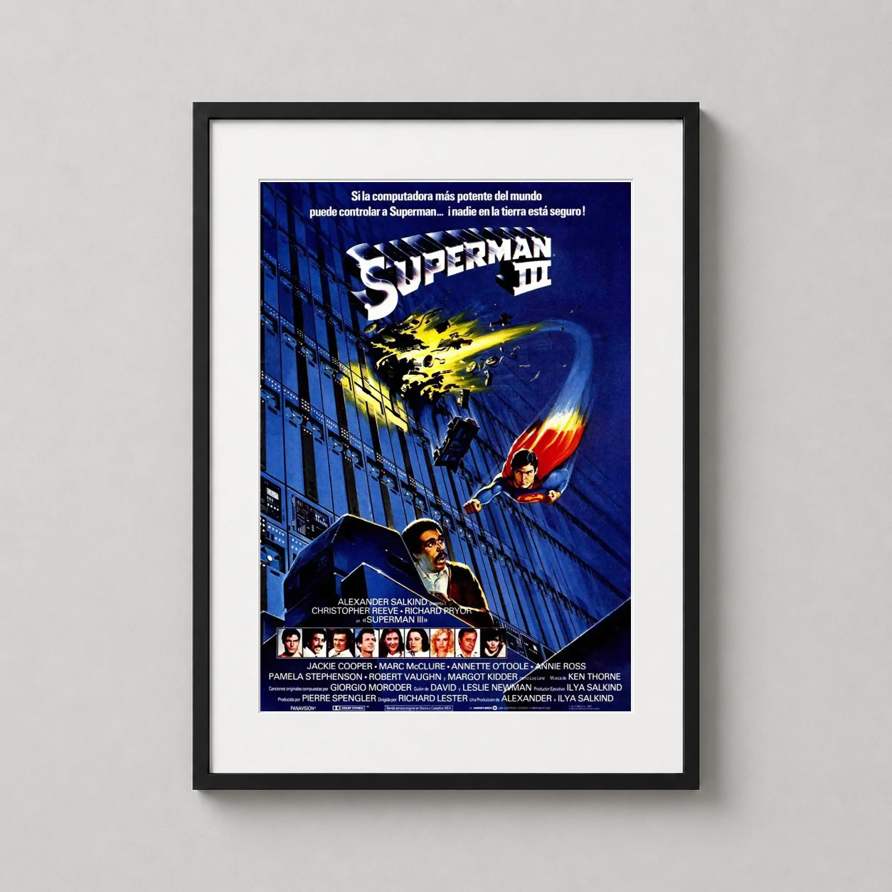 Room mockup of Superman III 1983 Classic Movie Poster, displayed as framed wall art in a home theater setting as a portrait print.