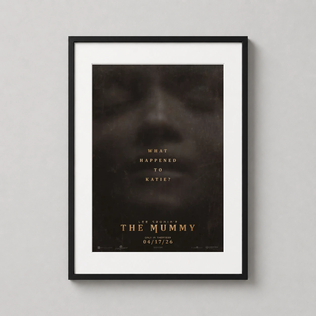 Mummy Lee Cronin — dark, minimalist movie poster for The Mummy 2026 featuring a shadowed