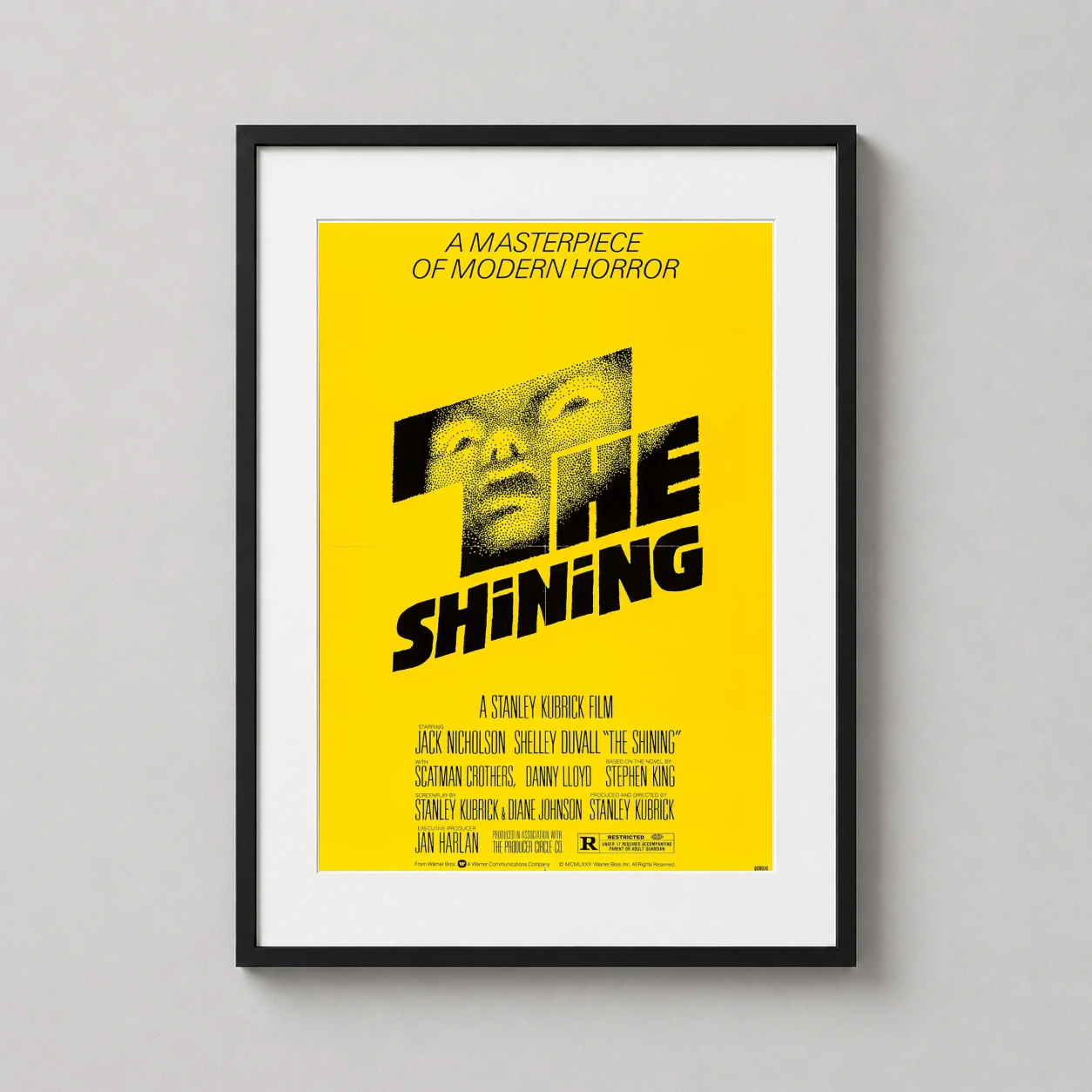 Shining 1980 Saul Bass — striking yellow movie poster for The Shining featuring halftone