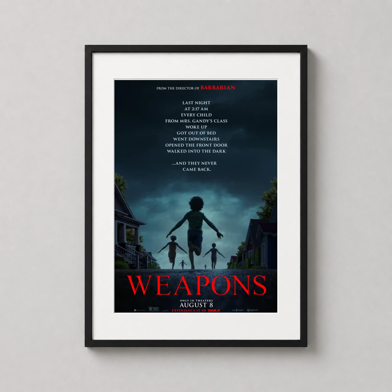 Weapons — featuring silhouettes of children walking into a moonlit suburban