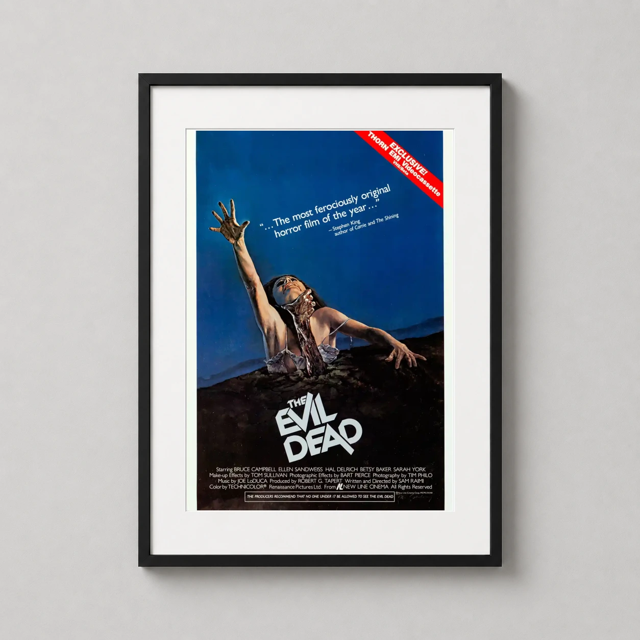 Evil Dead — vintage The Evil Dead movie poster featuring the iconic image of a hand