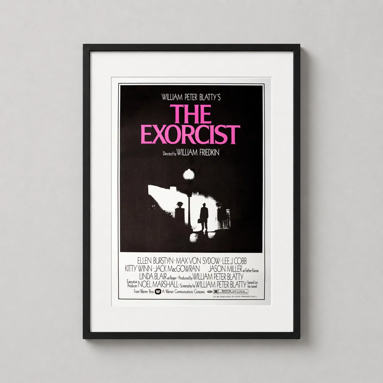 Father — featuring the chilling silhouette of Father Merrin under a streetlamp