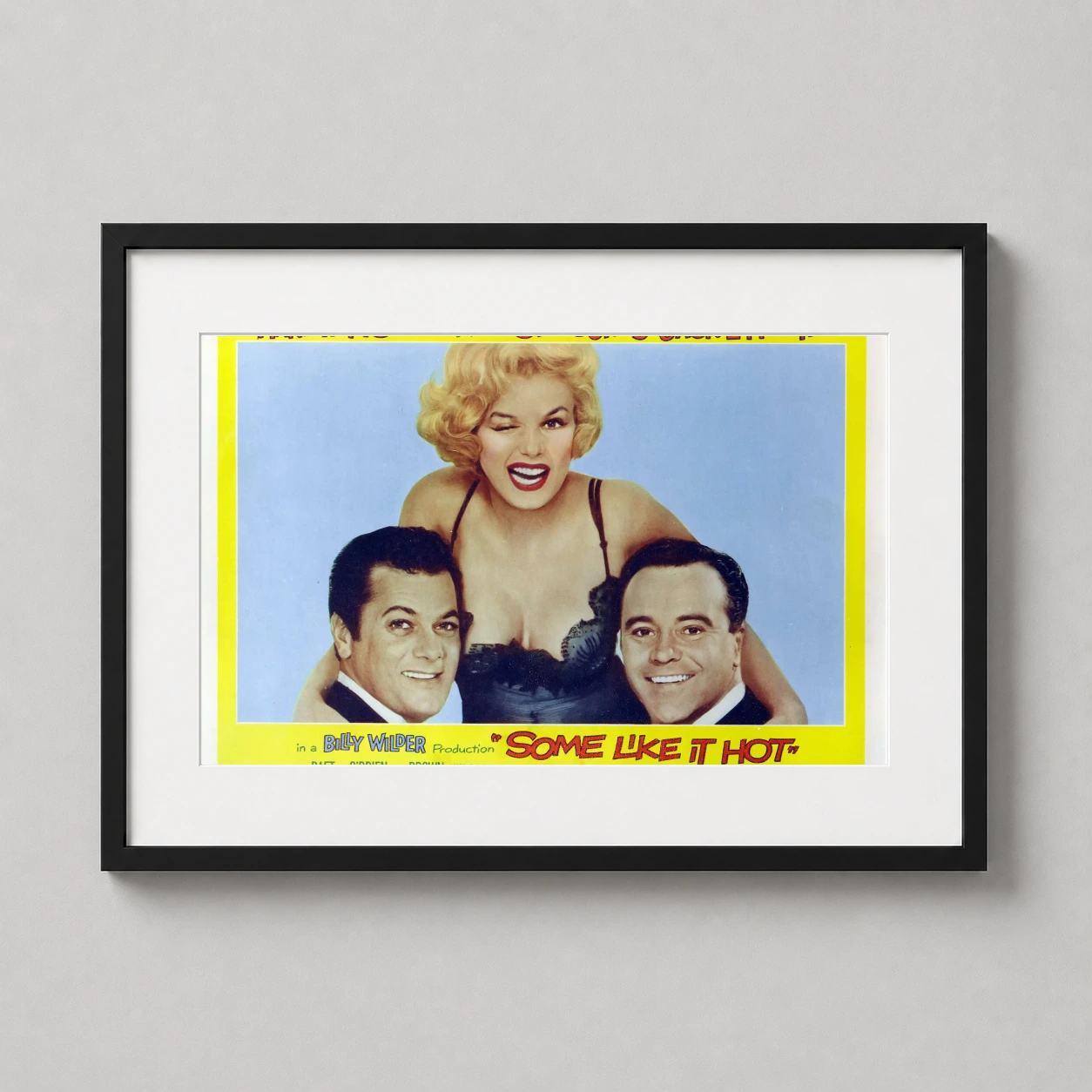 Some Like It Hot — marilyn Monroe winks playfully alongside Tony Curtis and Jack Lemmon in
