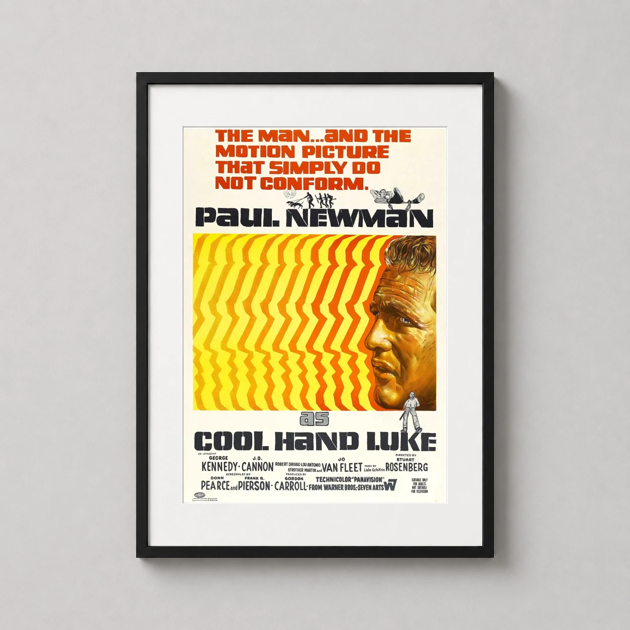Cool Hand Luke — featuring Paul Newman’s profile against a psychedelic yellow and orange