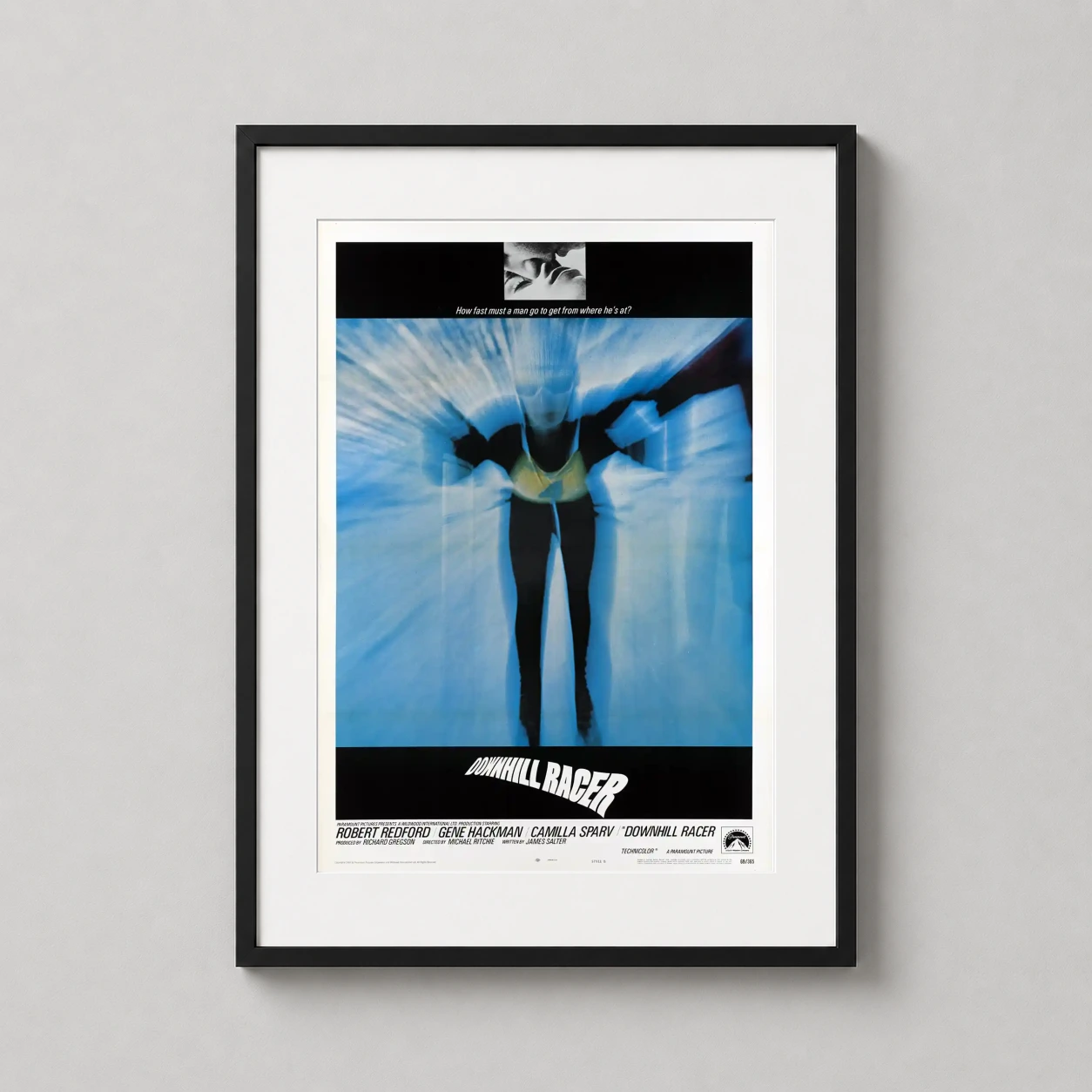 Downhill Racer — abstract blue speed blur of a skier in motion with classic 1969 film