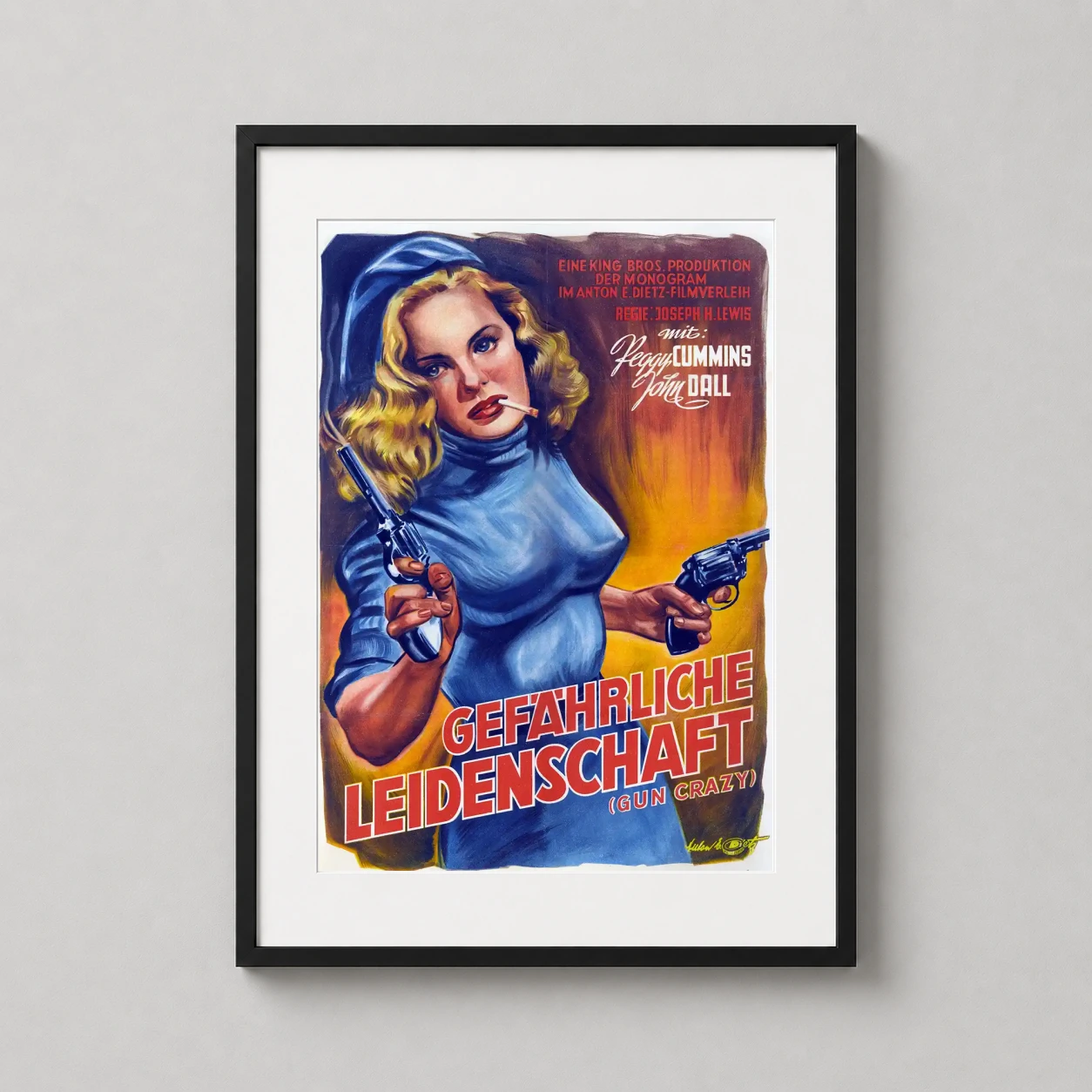 Gun Crazy — blonde woman in a blue dress holds two smoking revolvers against a