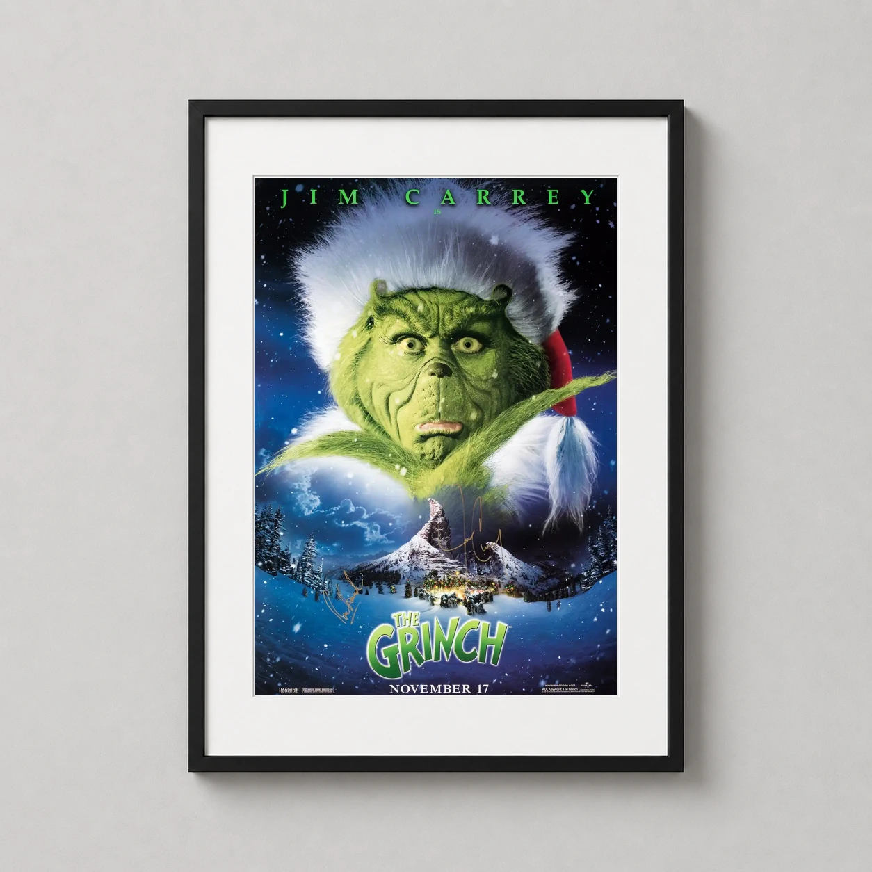 Jim Carrey the Grinch — this advance movie poster features Jim Carrey as the Grinch in a Santa
