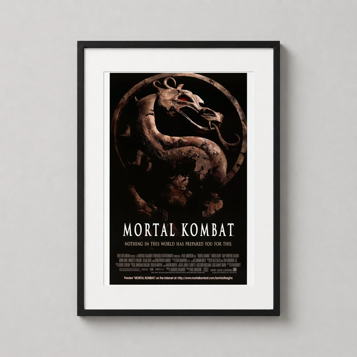 Mortal Kombat — weathered, stone-carved dragon medallion from the original 1995 Mortal