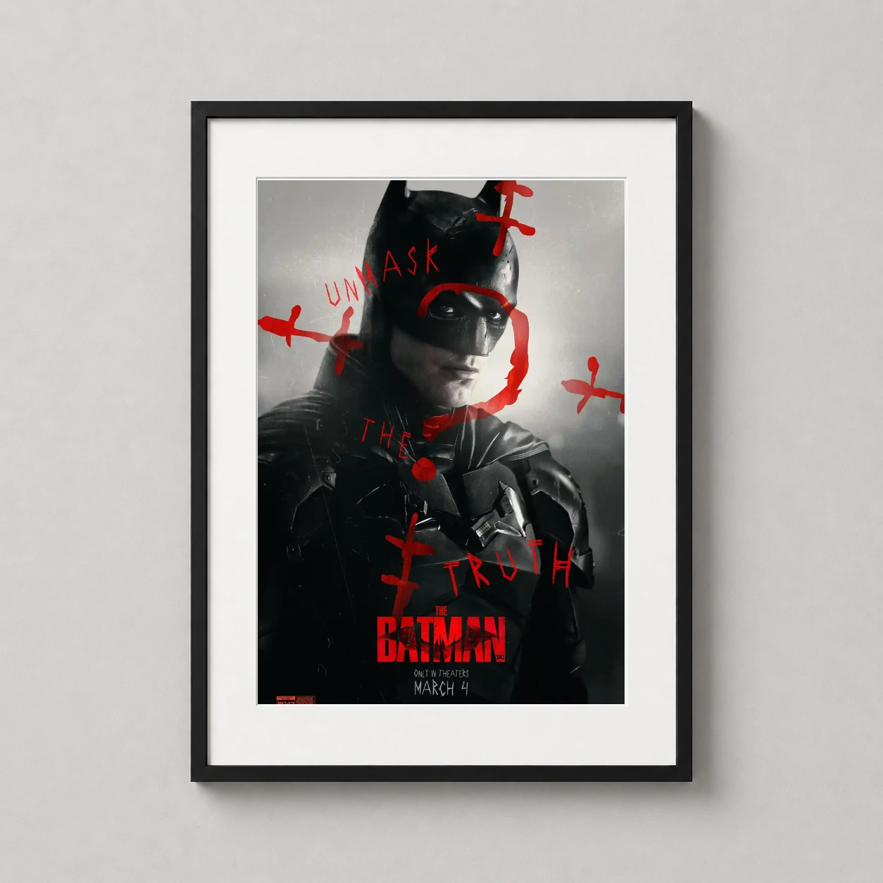 Room mockup of The Batman 2022 Red Grunge Movie Poster Cinematic Print, displayed as framed wall art in a home theater setting as a portrait print with black and white and red tones.