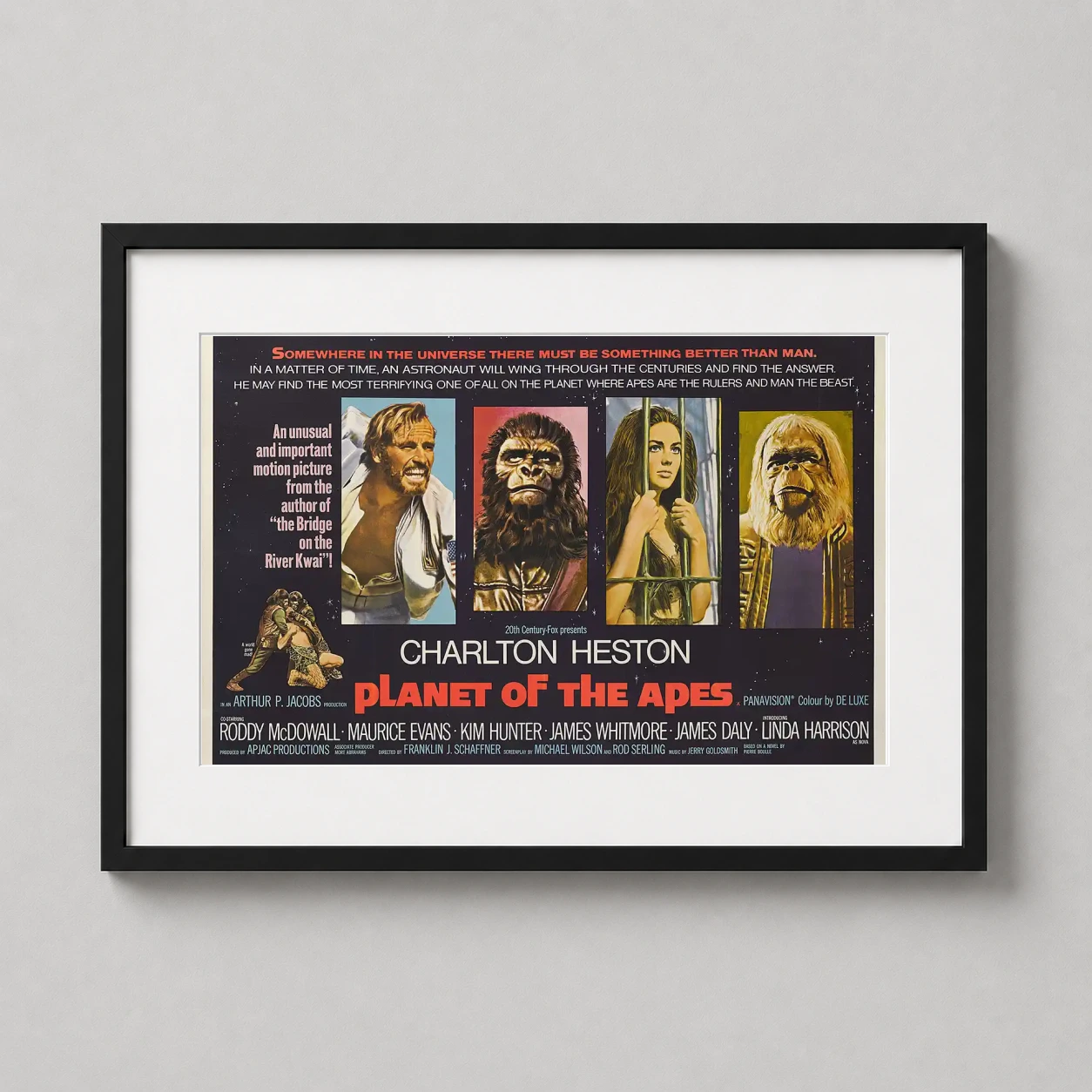 Room mockup of Planet of the Apes 1968 Vintage Classic Sci-Fi Art Movie Poster, displayed as framed wall art in a home theater setting as a landscape print with blue and black tones.