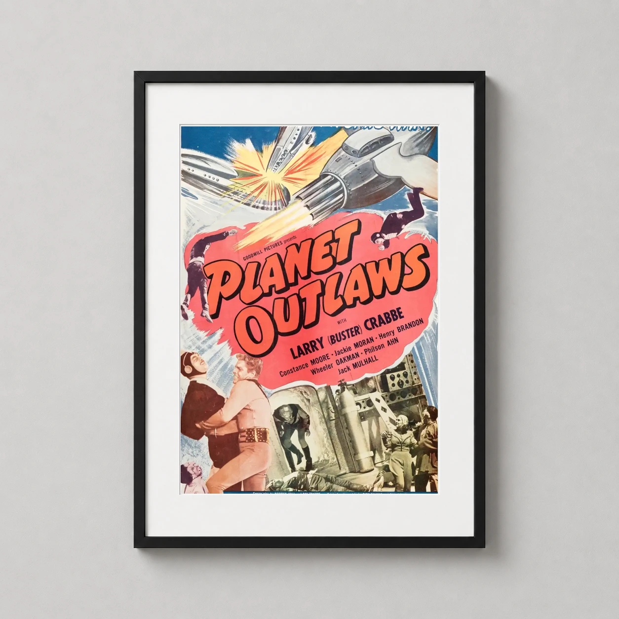 Room mockup of Planet Outlaws 1953 Vintage Sci-Fi Movie Poster, displayed as framed wall art in a home theater setting as a portrait print with pink tones.