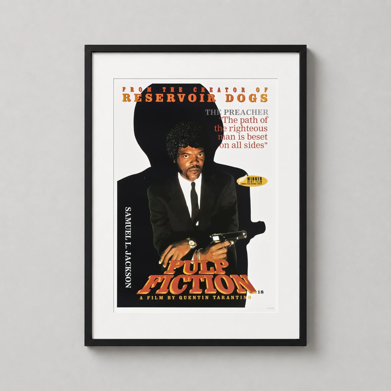 Room mockup of Jules Winnfield Pulp Fiction Cult Classic Movie Poster, displayed as framed wall art in a home theater setting as a portrait print with orange tones.