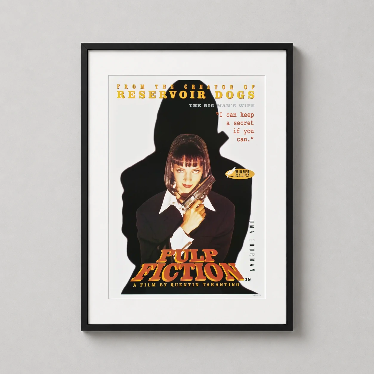 Room mockup of Pulp Fiction Mia Wallace Silhouette Movie Poster, displayed as framed wall art in a home theater setting as a portrait print with yellow, orange, and black tones.
