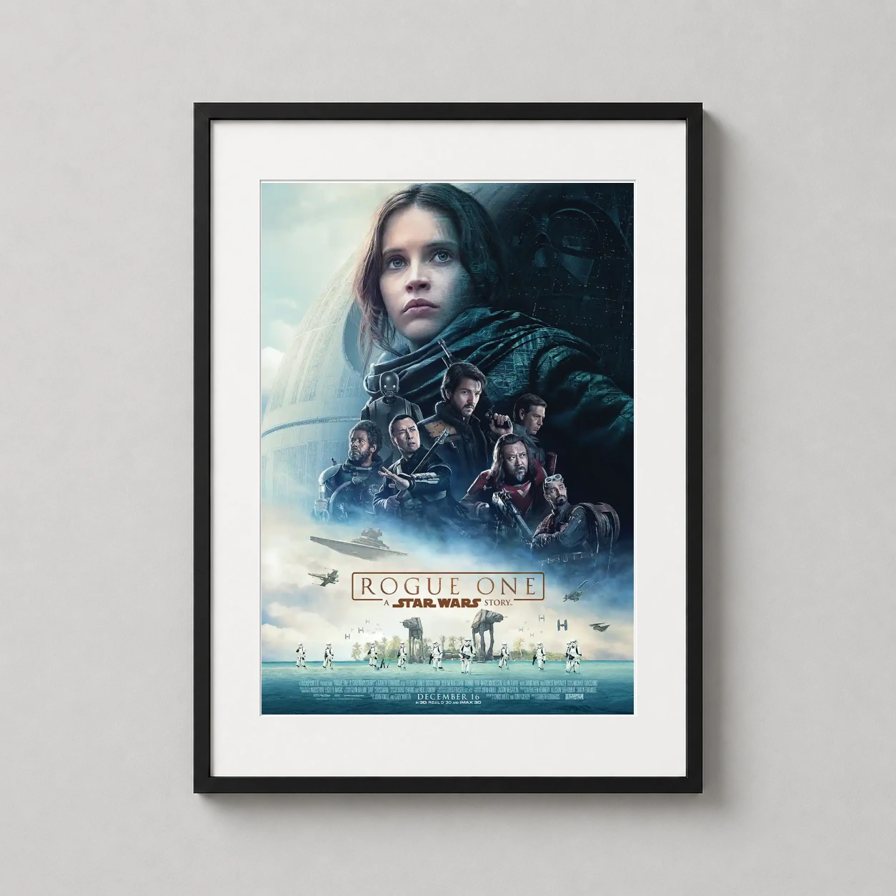 Rogue One a Star Wars Story — jyn Erso stands before the looming Death Star alongside the rebel crew
