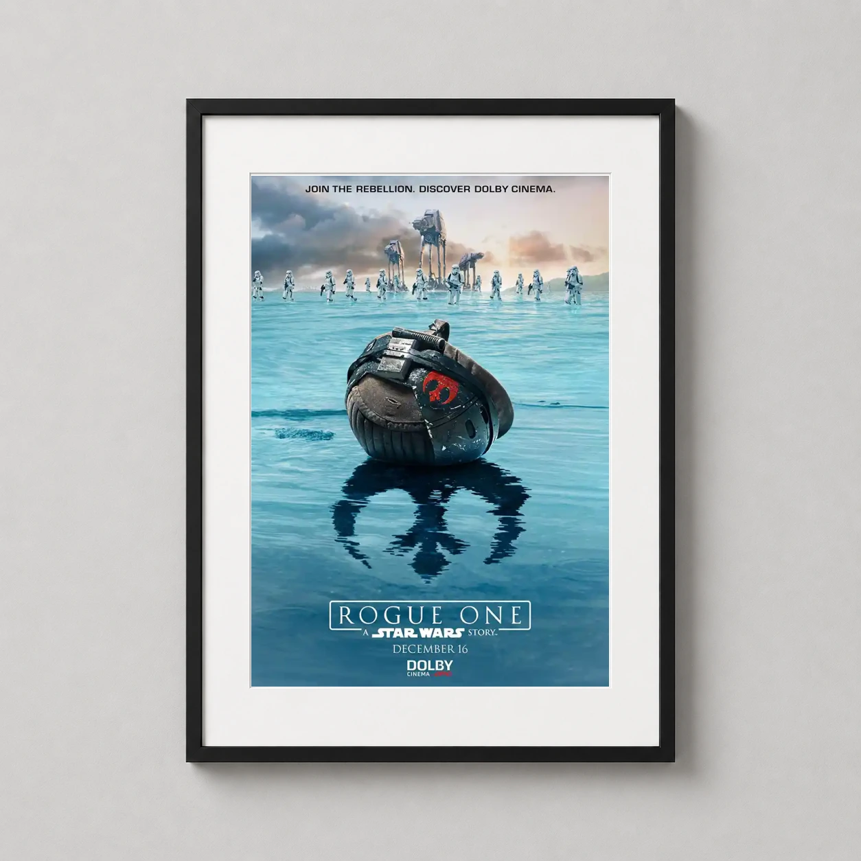 Room mockup of Rogue One Star Wars Scarif Battle Movie Poster, displayed as framed wall art in a home theater setting as a portrait print with blue tones.