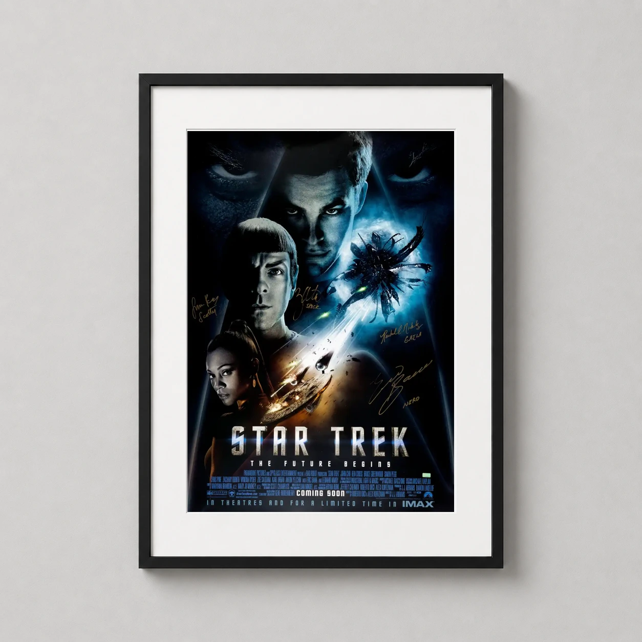 Star Trek — this cinematic poster features Kirk, Spock, and Uhura above the USS