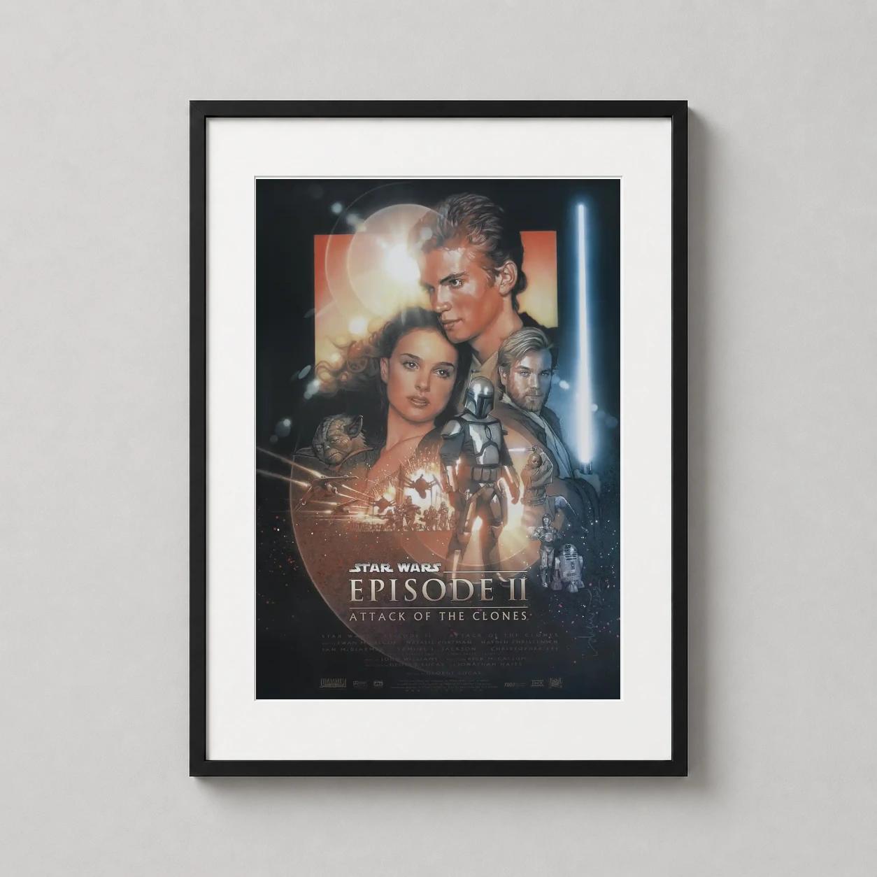 Room mockup of Star Wars Episode II Attack of the Clones Movie Poster, displayed as framed wall art in a home theater setting as a portrait print with blue and orange tones.