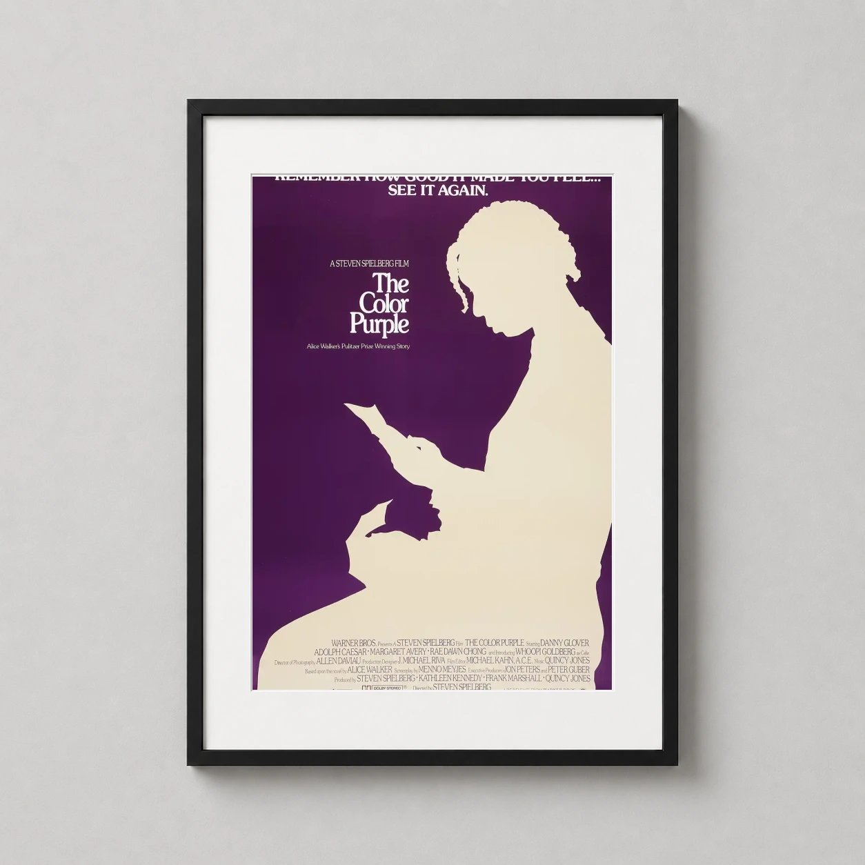 Room mockup of The Color Purple 1985 Dramatic Film Poster, displayed as framed wall art in a home theater setting as a portrait print with gold tones.