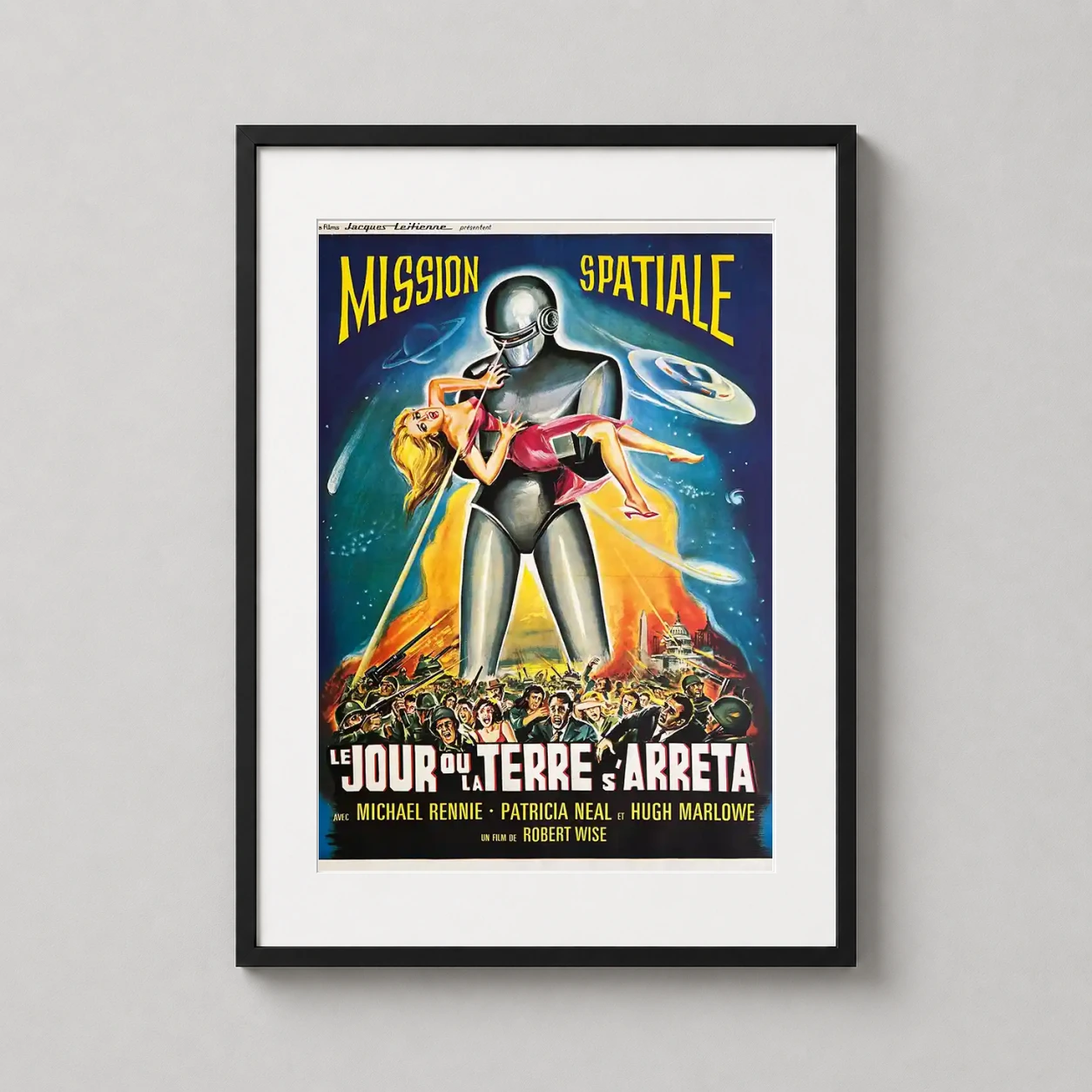 Room mockup of The Day the Earth Stood Still French 1960s Vintage Movie Poster, displayed as framed wall art in a home theater setting as a portrait print with red tones.