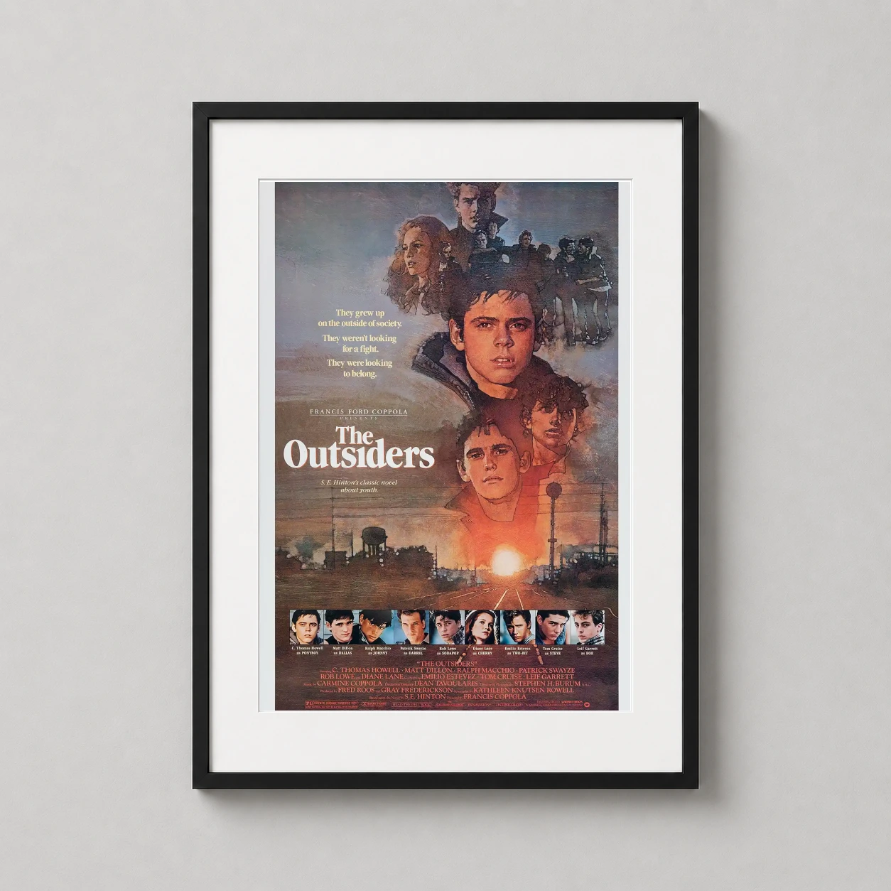 Outsiders — dramatic movie poster for The Outsiders featuring Ponyboy Curtis and