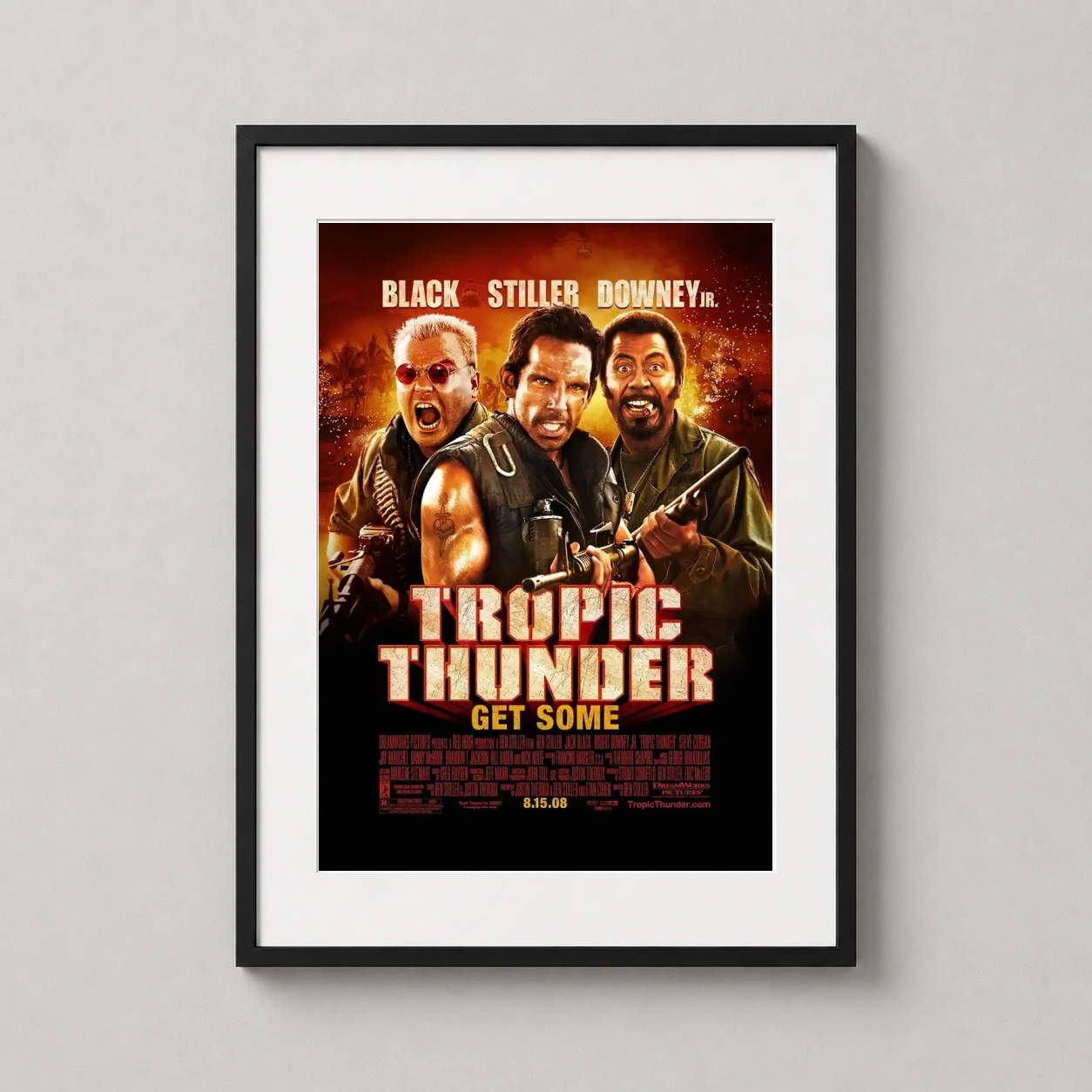Tropic Thunder Satirical — this bold movie poster features Ben Stiller, Jack Black, and Robert