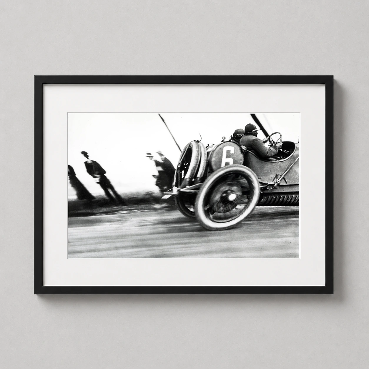 Jacques Henri Lartigue Grand Photo — high-speed 1913 Delage race car streaks across this black and white