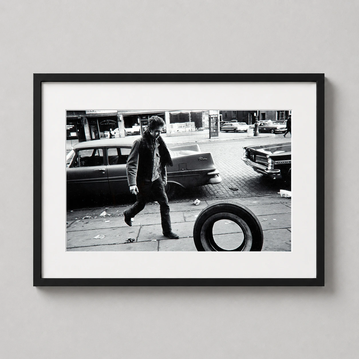 Jim Marshall Photography — candid black and white street photography featuring a young Bob Dylan