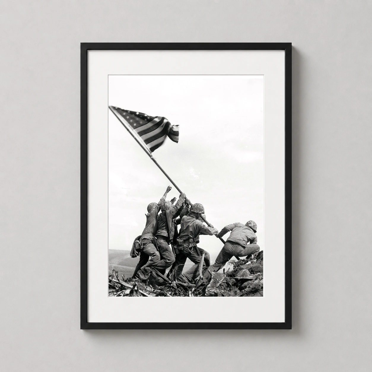 Raising Flag Iwo Jima Photo — high-contrast black and white photograph capturing six U.S. Marines