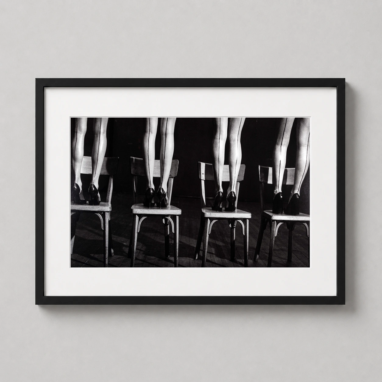 Peter Lindbergh — black and white Peter Lindbergh photograph featuring four pairs of legs