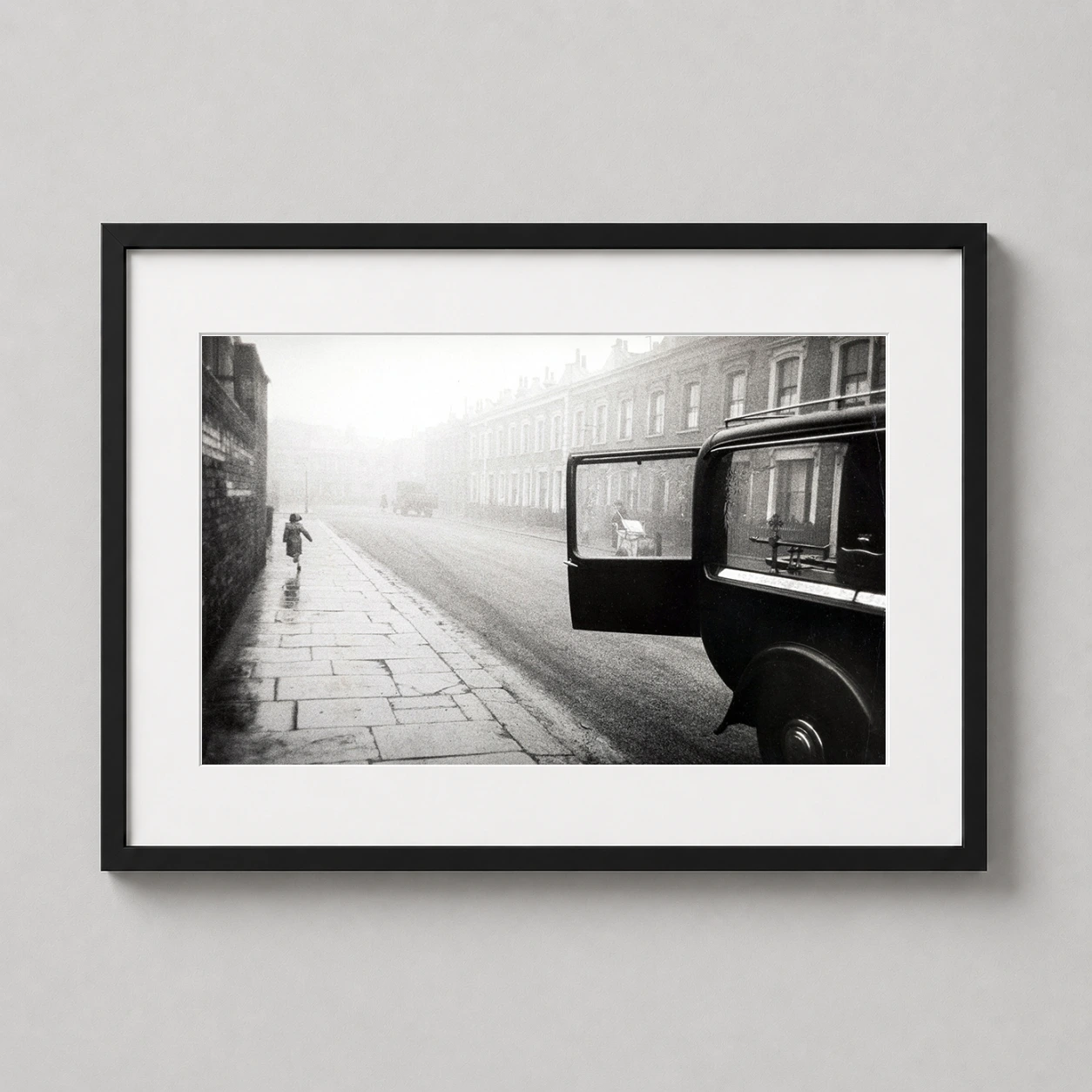 Robert Frank — misty 1951 London street scene featuring a child running past terraced