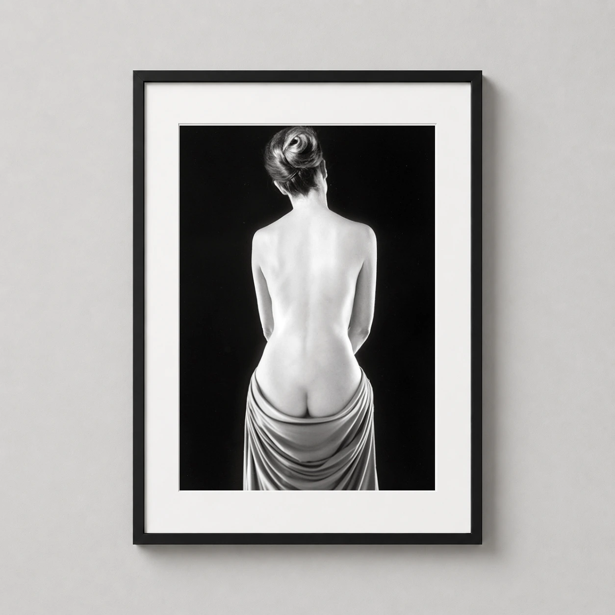 Ruth Bernhard Draped Torso — masterful black and white study of a female torso from behind