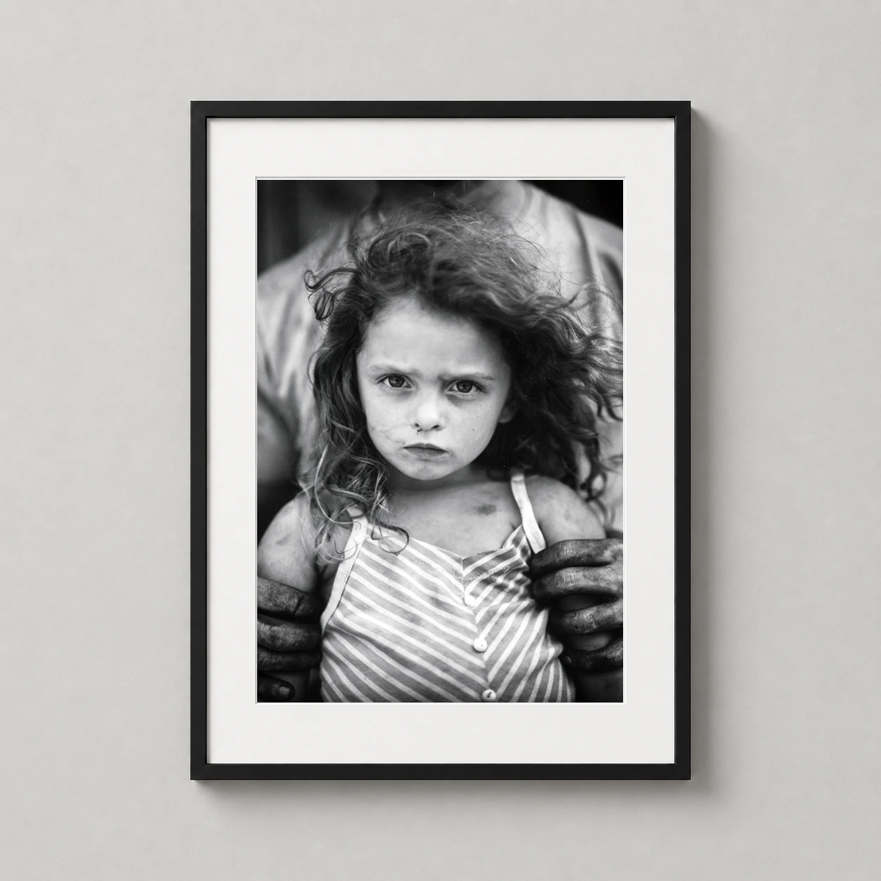 Sally Mann Holding Virginia — powerful black and white portrait featuring a young girl with wild hair