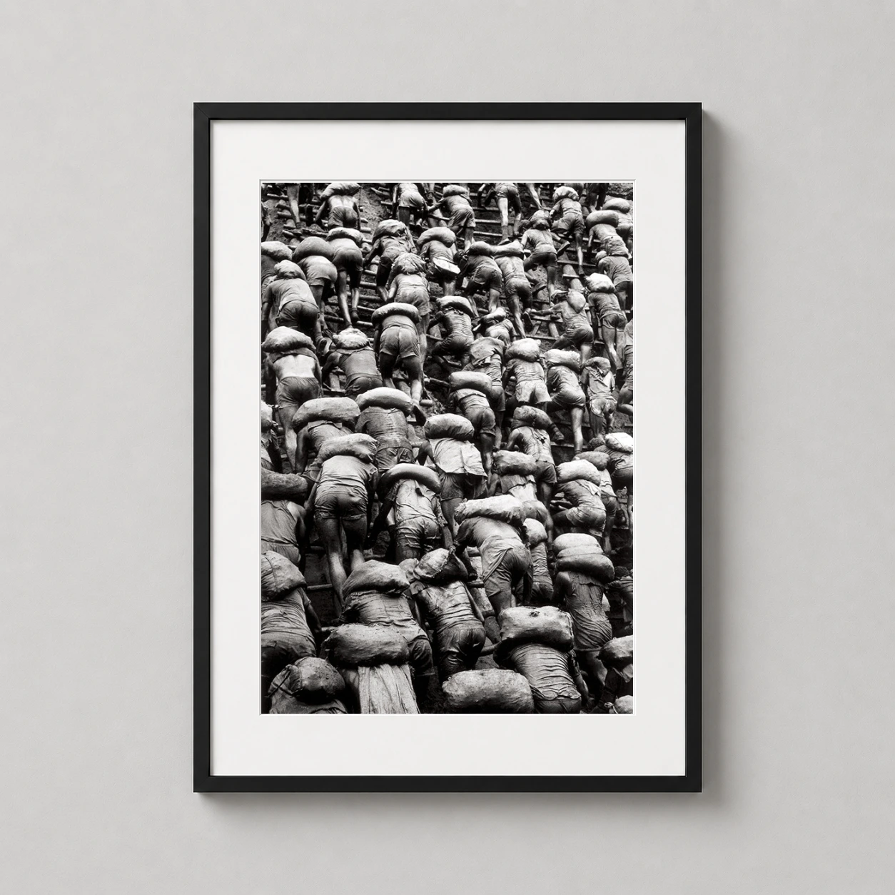 Sebastião Salgado Serra Pelada — dramatic black and white photograph by Sebastião Salgado depicting gold