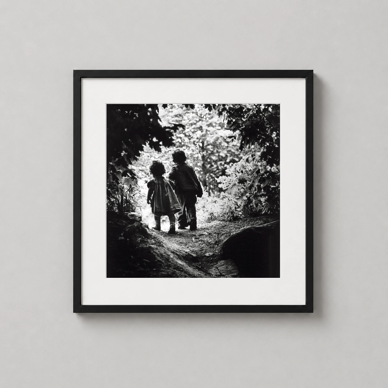 W. Eugene Smith Walk — poignant black and white photograph of two children walking through a