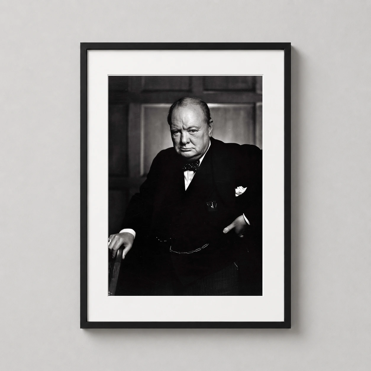 Room mockup of Yousuf Karsh Winston Churchill Portrait Print, 1941 Photography Print, displayed as framed wall art in a office setting as a portrait print.
